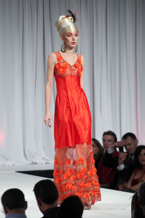 D'Lola Couture transparent lace sheath gown at Red Ball 2012 Fashion Show.
